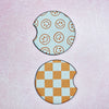 2 Car Coasters Orange Happy Checkered Design